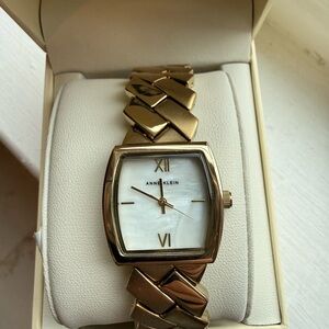 Anne Klein Gold Bracelet Watch with White Face
